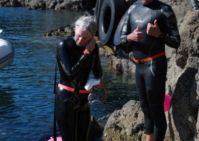 Amanda Love and Dave Astins having just finished swimming around Skomer in August 2022